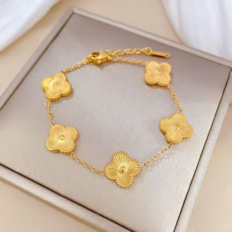 Titanium steel 18K gold four-leaf clover bracelet does not fade laser five flower fashion design sense high quality jewelry wholesale