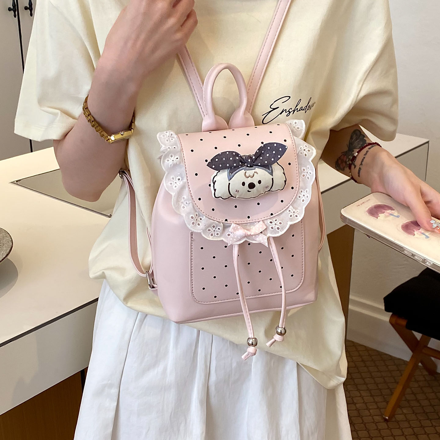 Mochila casual mochila de verano dibujos animados 2026 encaje versátil mochila escolar de mujer de viaje nuevo lindo punto de onda popular
