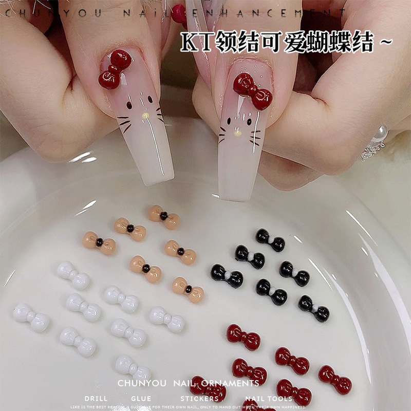 50 bowknot cartoon KT cat nail art red color three-dimensional resin bow tie DIY nail drill jewelry wholesale