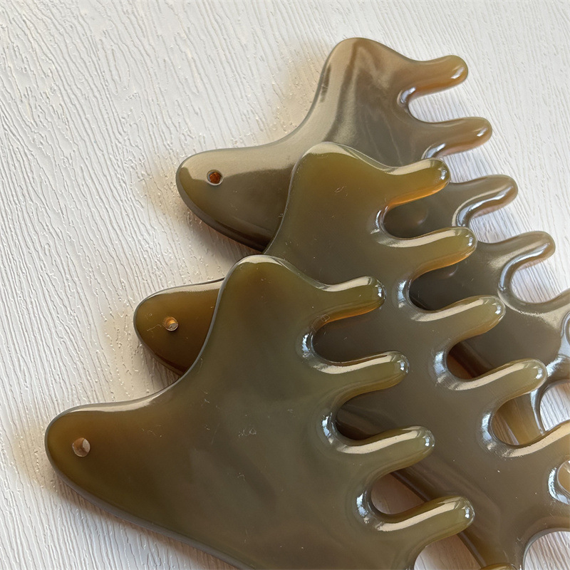 Yak Horn Massage Comb Four in One Head Scalp Meridian Comb for Wellness Massage 7x11 cm in use