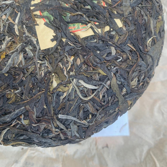 2013 Yunnan Mengku Qizi Cake Round Tea Dasueshan Ancient Tree Pu'er Tea Raw Tea Cake Aged Raw Tea Brick Tea Cake