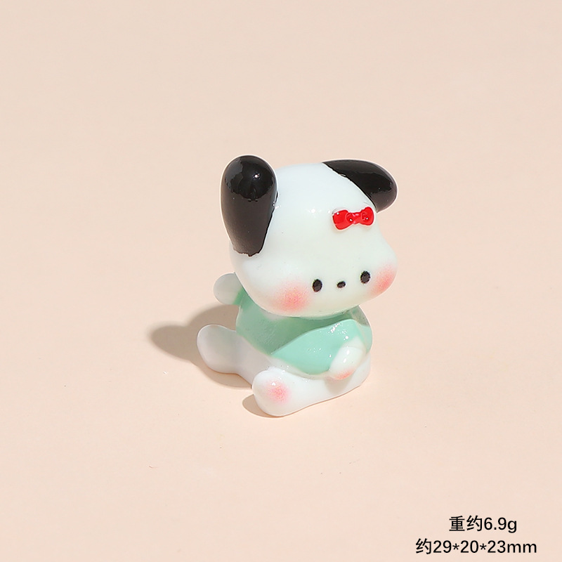 녹색 옷을 입은 강아지