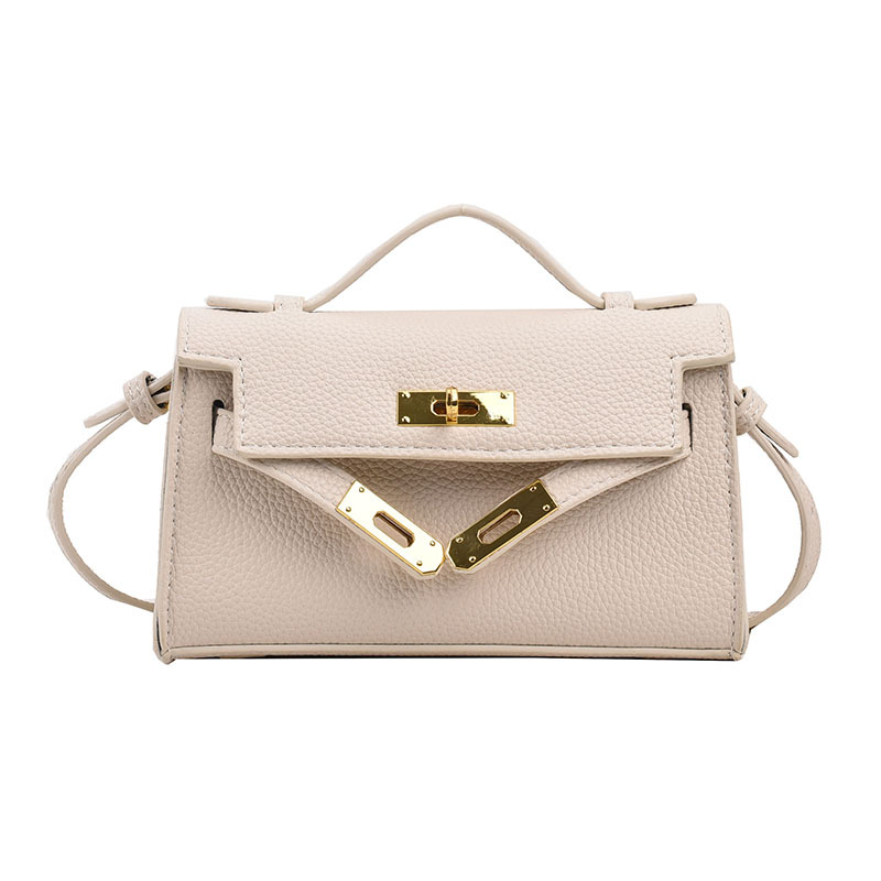 Mini bolso Kelly transfronterizo para niños, bolso de hombro tipo bandolera de un solo hombro con lápiz labial familiar de moda versión coreana de otoño 2023 para mujer