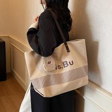 帆布托特包包女休闲大容量托特包2025新款小众字母韩版手拎单肩包