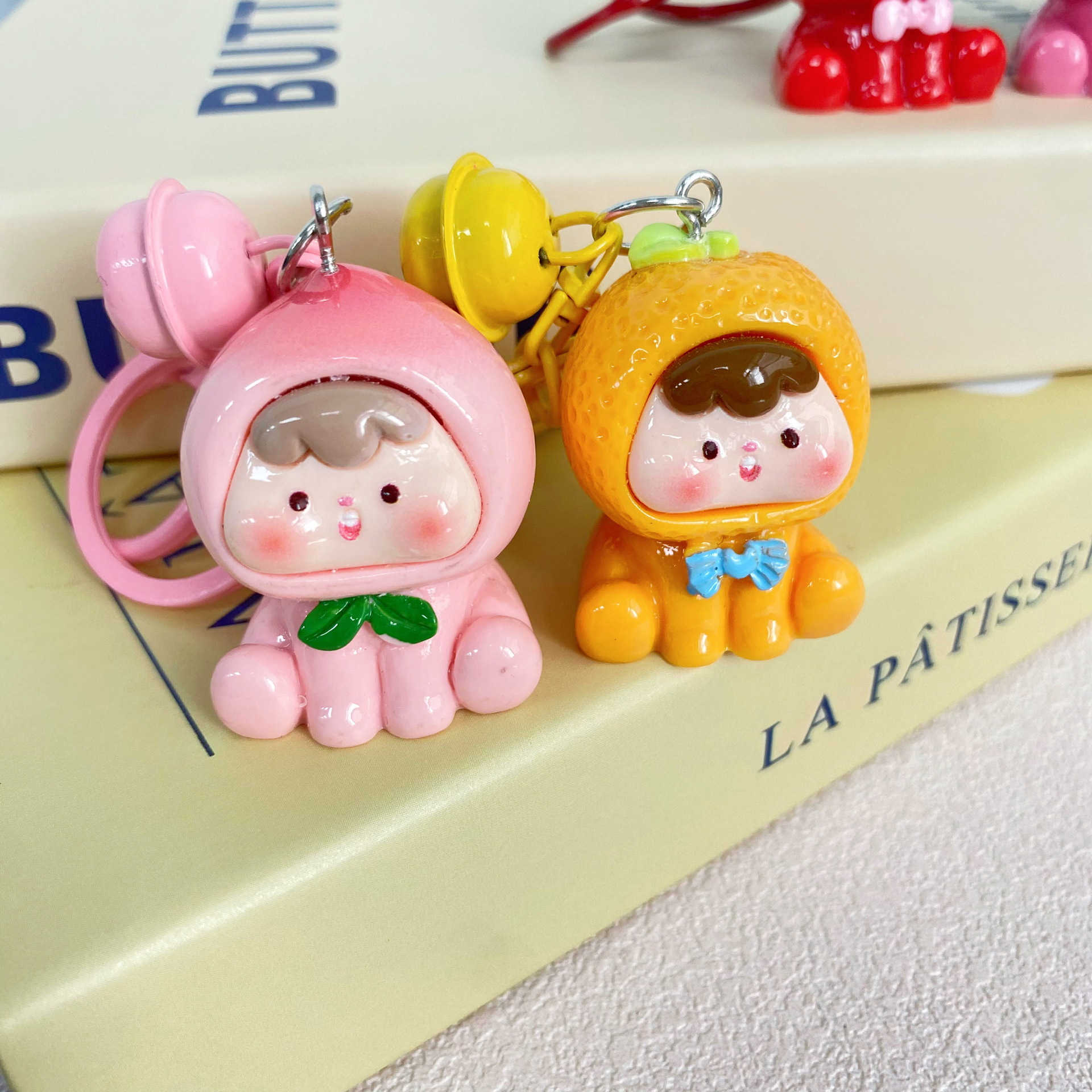 新商品の立体果物の子の鈴の鍵は少女の心の学生を掛けて親友のプレゼントを飾ってカップルを掛けます。