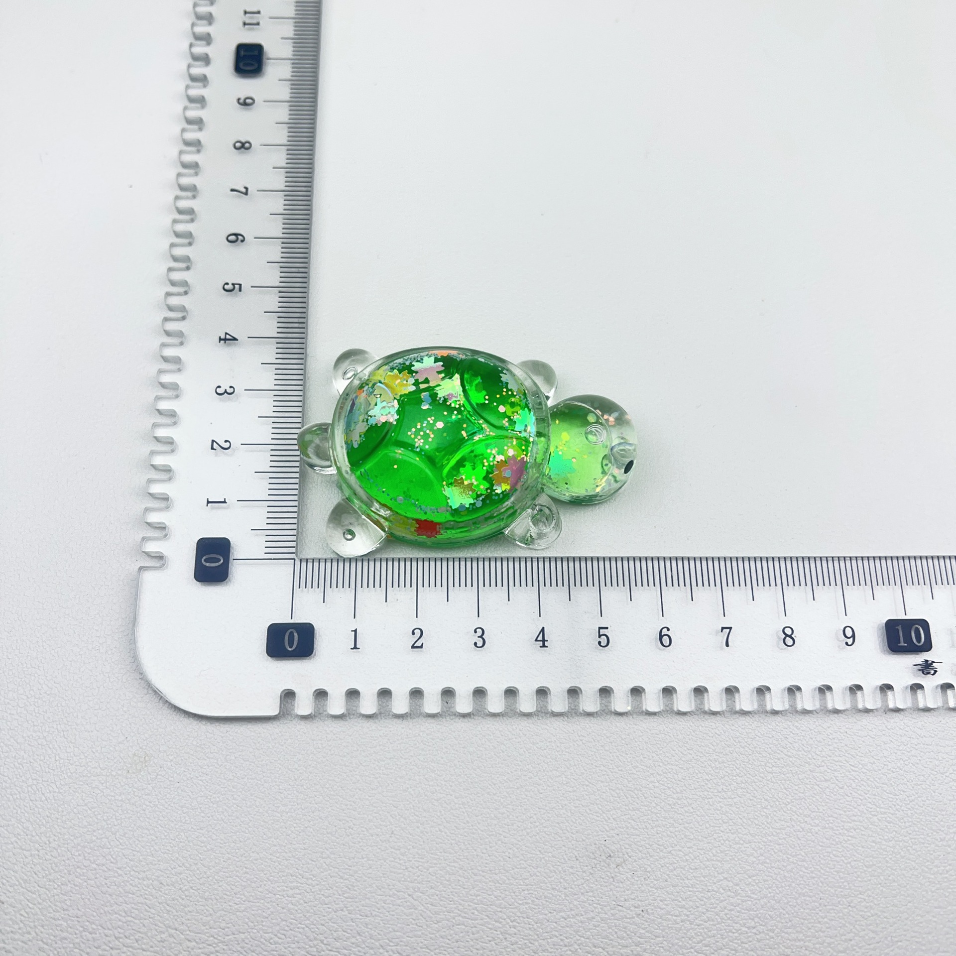 Chatter en vivo explosión de joyería DIY arena flotante en aceite explosión tortuga llavero bolso de teléfono móvil colgante decoración de escritorio