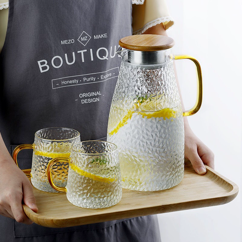 Glass teapot, capacious transparent with a forged pattern set