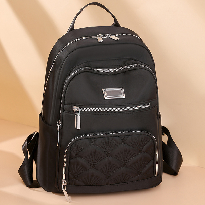 Comercio exterior al por mayor 2024 nuevo estilo casual señoras mochila de nailon moda estilo occidental al aire libre mochila de viaje de gran capacidad