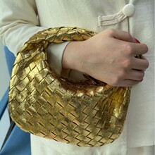亚马逊速卖通爆款饺子包2025褶皱打结包纯手工编织牛角包手拎包包