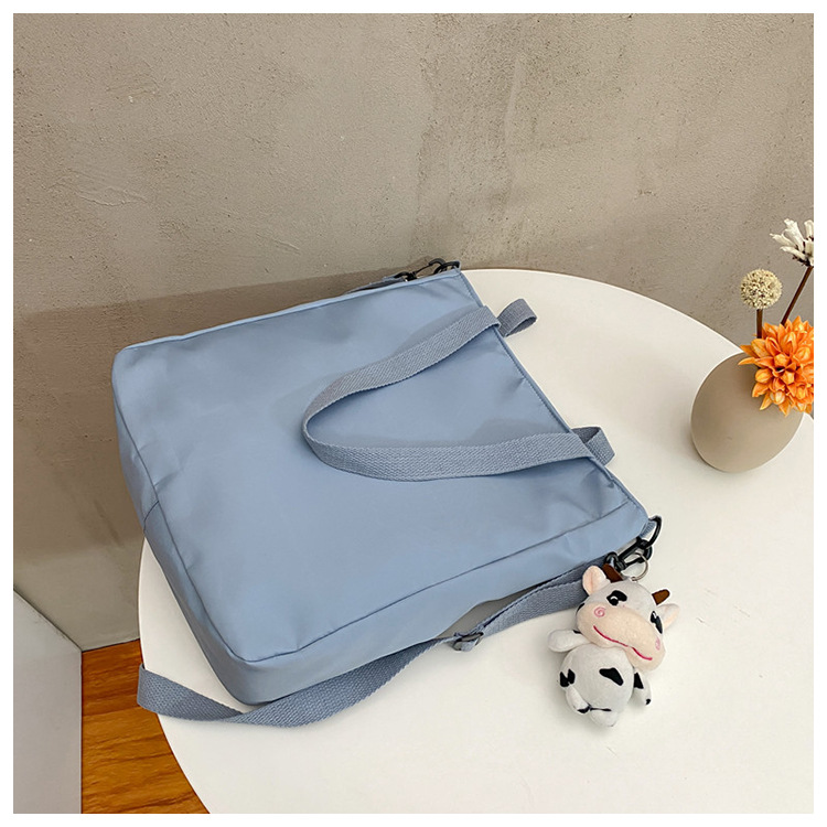Large-capacity Japanese-style single-shoulder canvas bag for girls, versatile crossbody, ins, a tote bag for junior high school students' classes, and a schoolbag for after-school tutoring undefined