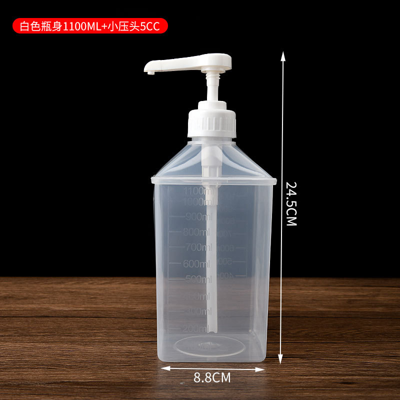 Botella de presión de azúcar presión de la mano de vidrio de plástico cuantitativa fruta de la Pasión grano grueso fructosa apretón botella comercial leche suministros de té