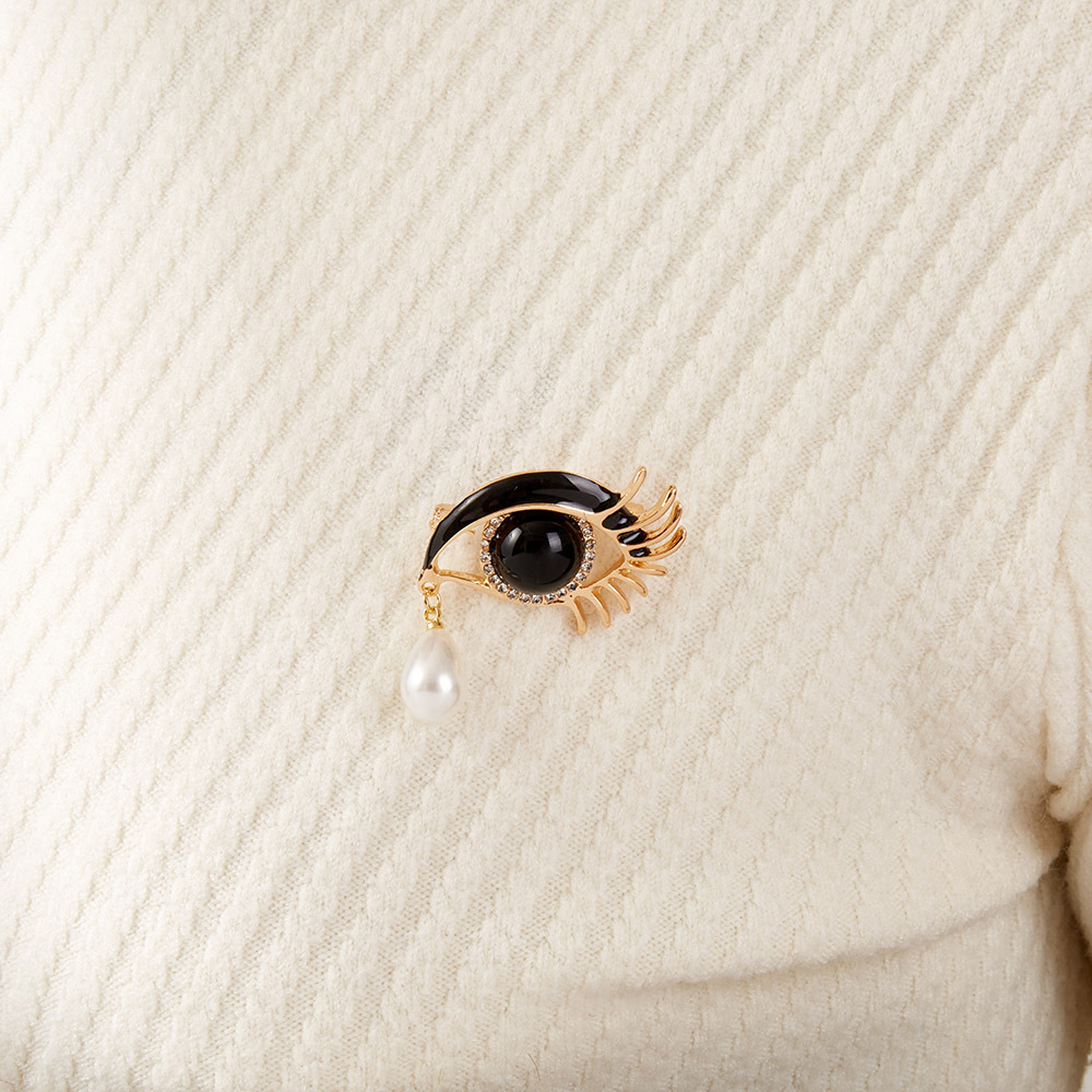 Spilla occhio con perla barocca vintage da donna per tailleur_voghion.com