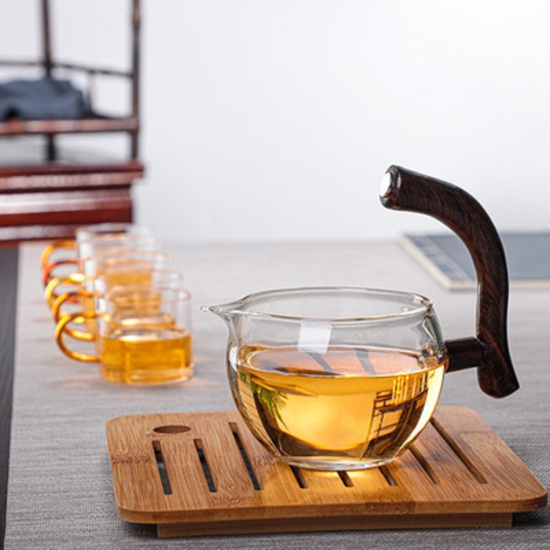 Fábrica al por mayor Palacio lámpara juego de té de vidrio borosilicato fabricante de té perezoso Kung Fu juego de té traje de succión magnética juego de té