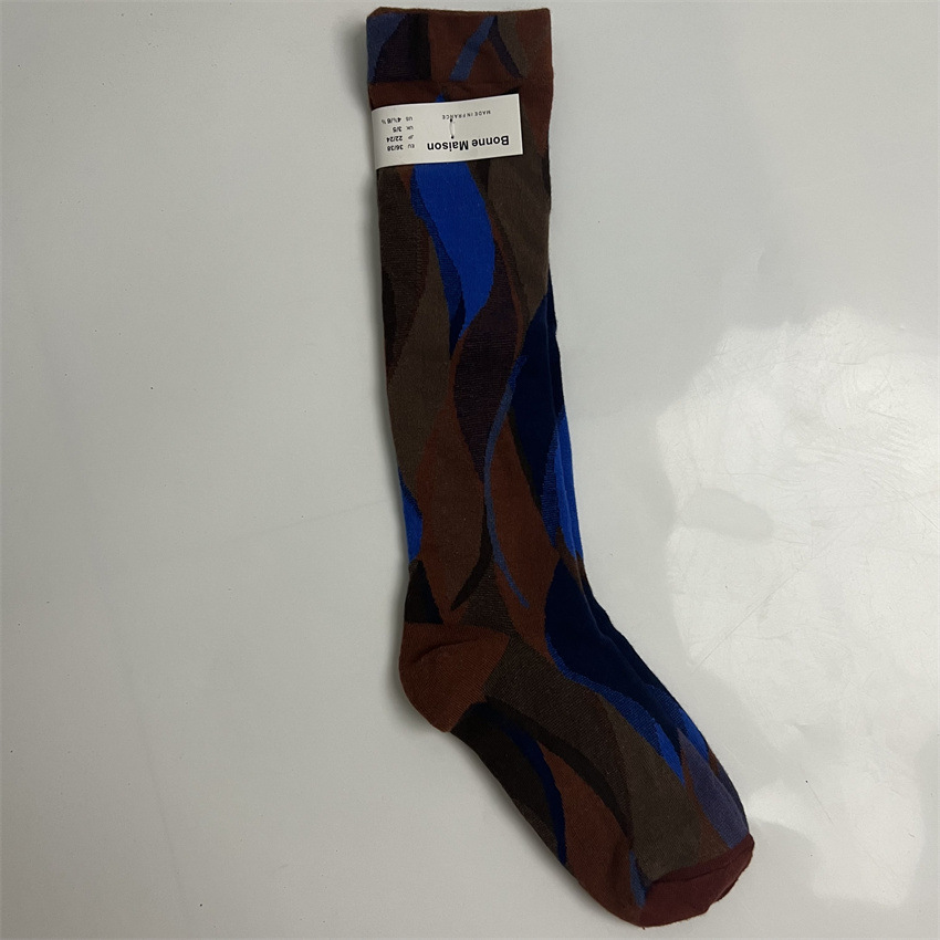 Calzini lunghi Happy Socks in cotone con motivo astratto artistico intrecciato, alti fino al ginocchio, autunno inverno, BOONE MAISON, 2025d, francesi_voghion.com