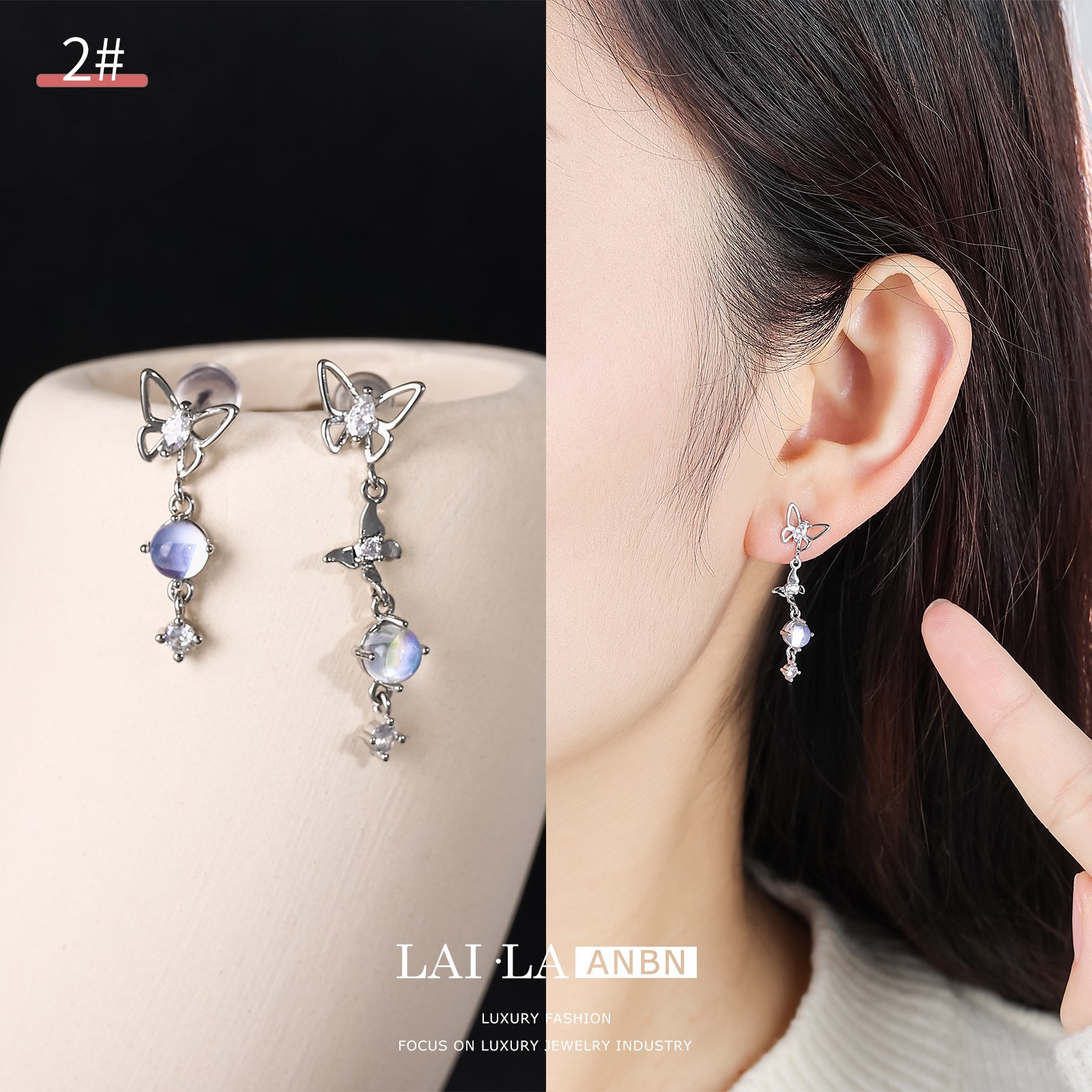 Mosquito bobina oreja clip hembra sin oreja estilo coreano Super Hada elegante exquisita mariposa Stud pendientes nicho Moonstone pendientes al por mayor