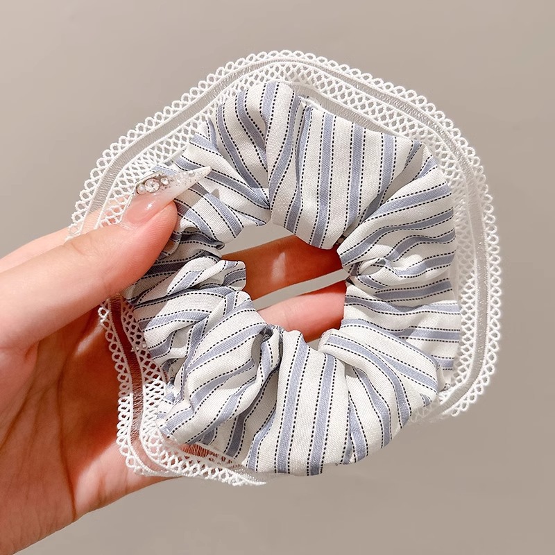 Pastoral viento intestino anillo de cabello mujer 2025 nuevo estilo de alta sensación bola de cabello cuerda de cabeza flor dulce princesa adornos de cabello cuerda