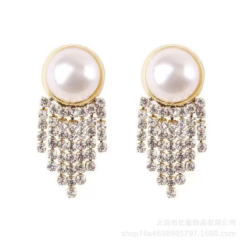 S925 Pendientes de perlas de temperamento Pendientes de lujo ligero de alta gama Pendientes al por mayor y al por menor transfronterizos Mujeres