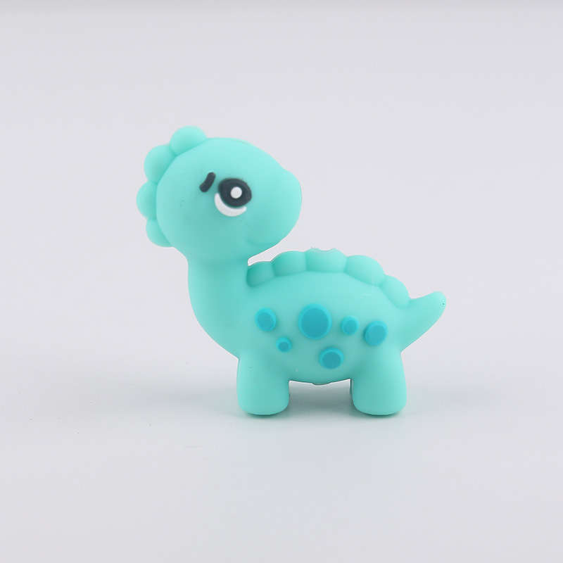 Dibujos animados Dinosaur Dental Topeador Cuentas de goteo Bolígrafo de cuentas de bricolaje Pezones para bebés Cadena anti-caída Amazon