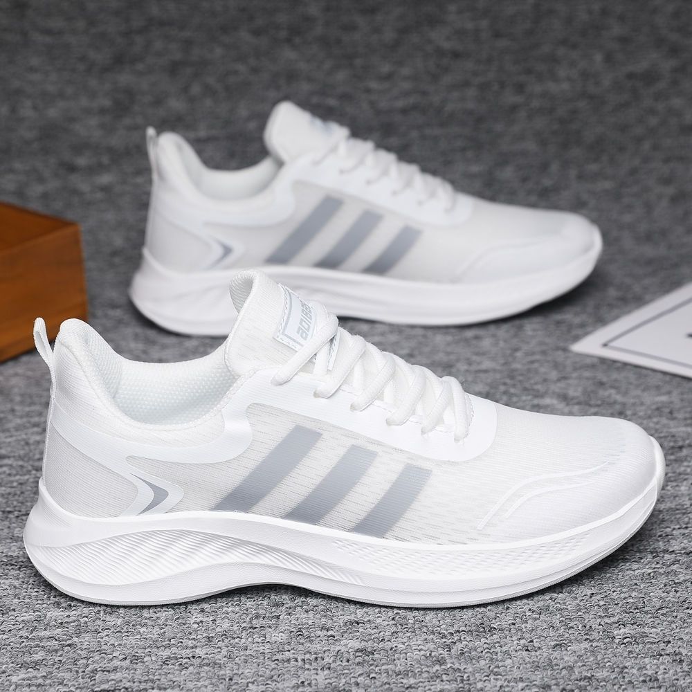 Verano nuevo estilo zapatos deportivos de talla grande estilo pareja superficie de malla de alambre de pescado pies ultraligeros y no cansados zapatos casuales de hombre para correr de todo fósforo