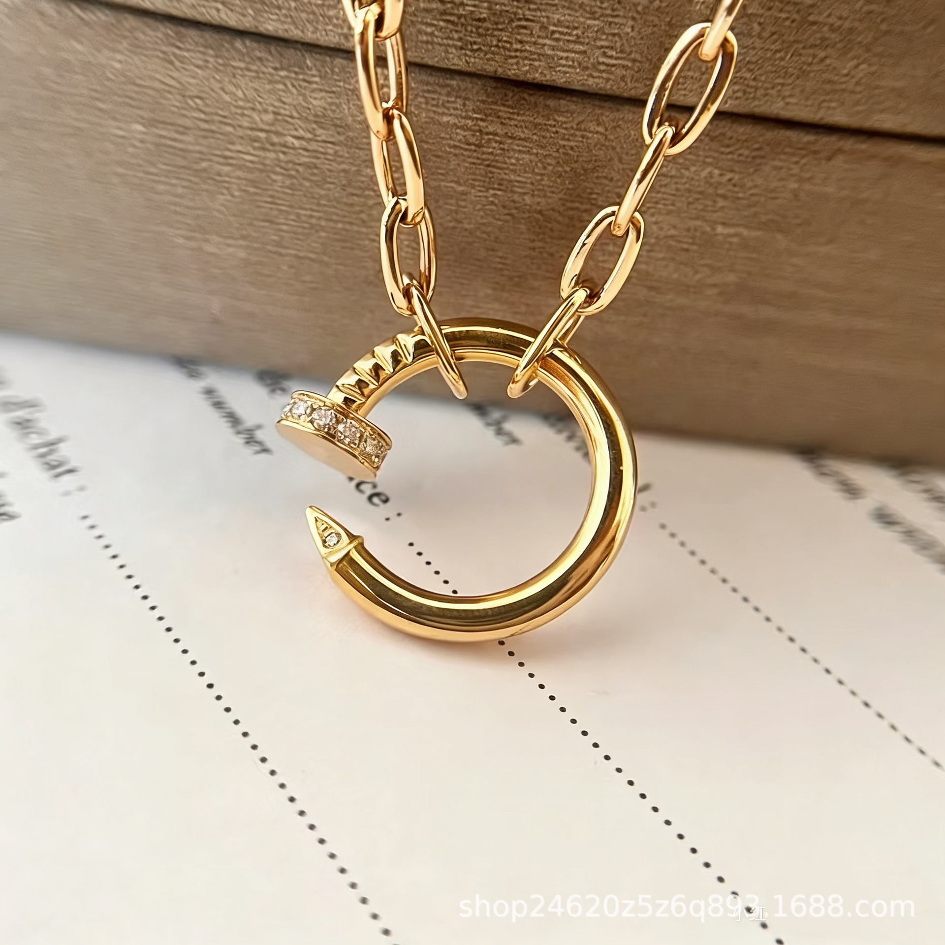 Thick chain gold head and tail diamond nail necklace