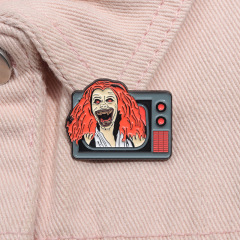 Horrifying character design of a punk-style badge depicting a cartoon character from Western and Eastern movie merchandise crawling out of a television