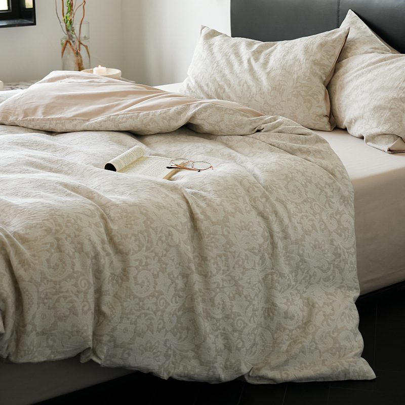 Alta sensación de algodón de tres capas de hilo en la cama de cuatro piezas conjunto 2025 nuevo lavado con agua de algodón ropa de cama Jacquard sábanas