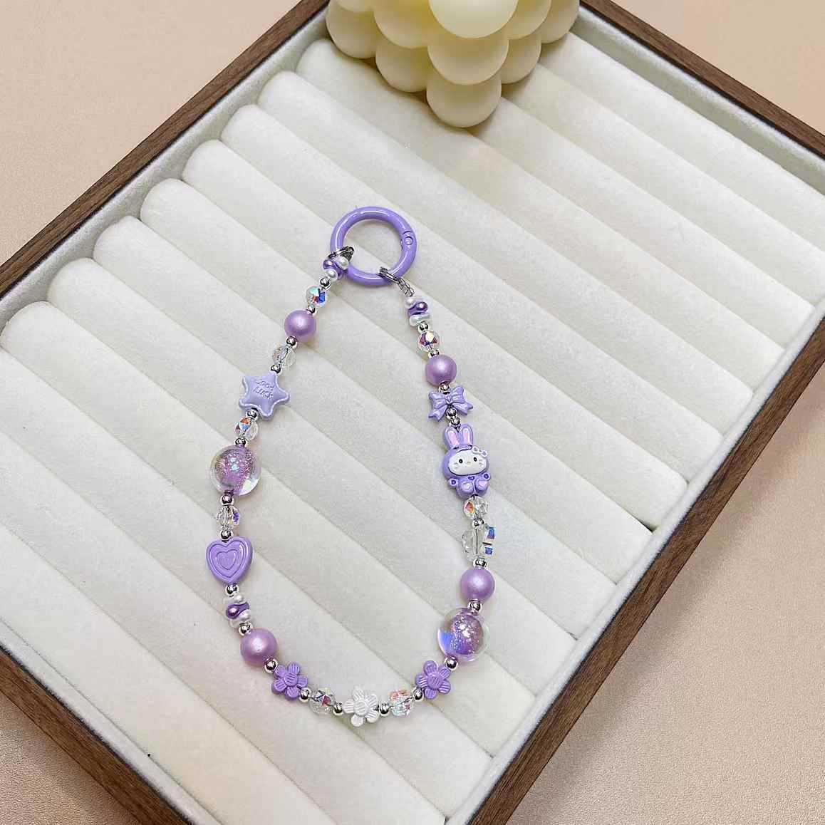 Creativo de dibujos animados KT conejo aleación cadena teléfono móvil cordón muñeca nuevo DIY hecho a mano cuentas estrella de cristal colgante de equipaje