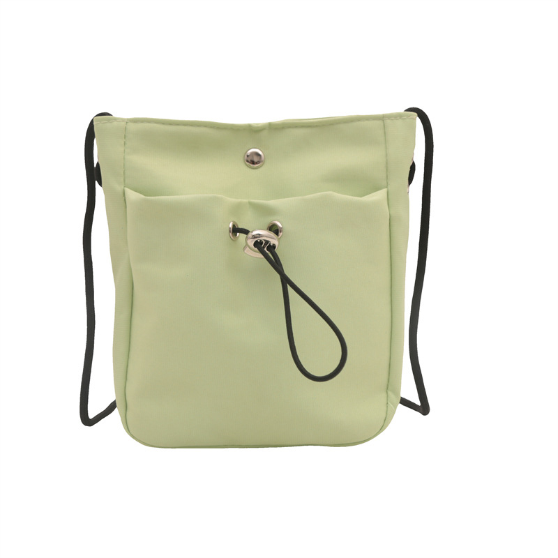 Bolsos de teléfono móvil de viento minimalistas para mujeres japonesas y coreanas bolsos de lona ligeros de cuerda de dibujo mini multifuncional bolsos de cambio de hombro