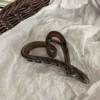 Deep brown love grabbing