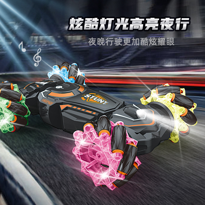 Transfronterizos acrobacias de control remoto de doble cara rueda de luz nocturna luces de deriva lateral fresca música recargable coche de juguete de cuatro tracciones