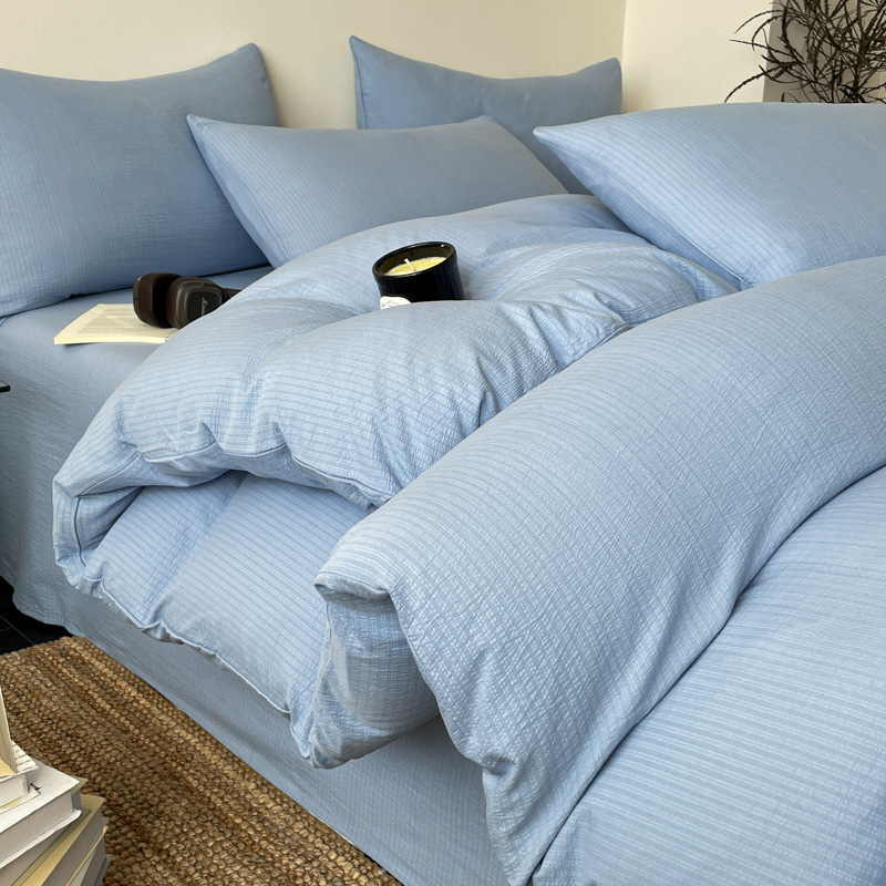 Classe A algodón puro sin impresión de aire cuatro piezas de ropa de cama de algodón lavable, cama de cama de algodón dormitorio de estudiantes de tres piezas