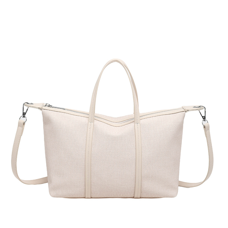 Bolsa de mano de gran capacidad de viaje coreano para mujeres 2026 nueva moda de verano simple bolsa de hombro retro