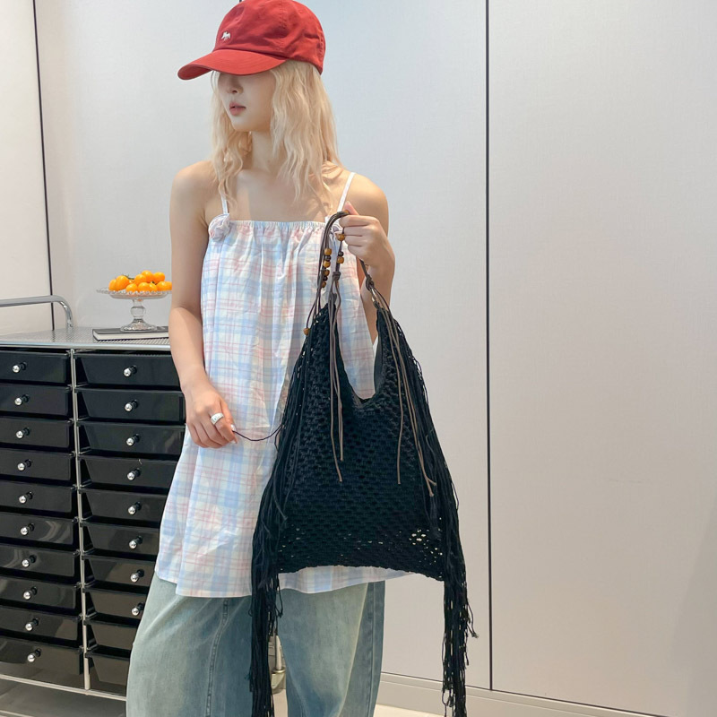 Bolso de vacaciones junto al mar 2025 verano nuevo estilo bolso de hombro tejido con flecos bolso de mensajero de gran capacidad mujer