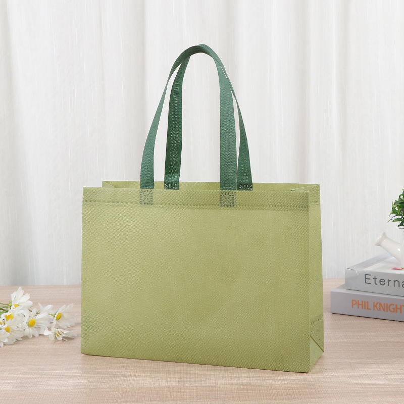 Bolsas de tela no tejida tiendas de souvenirs de viajes de madres y bebés en línea bolsa de compras de mano engrosada bolsa de mano image 18