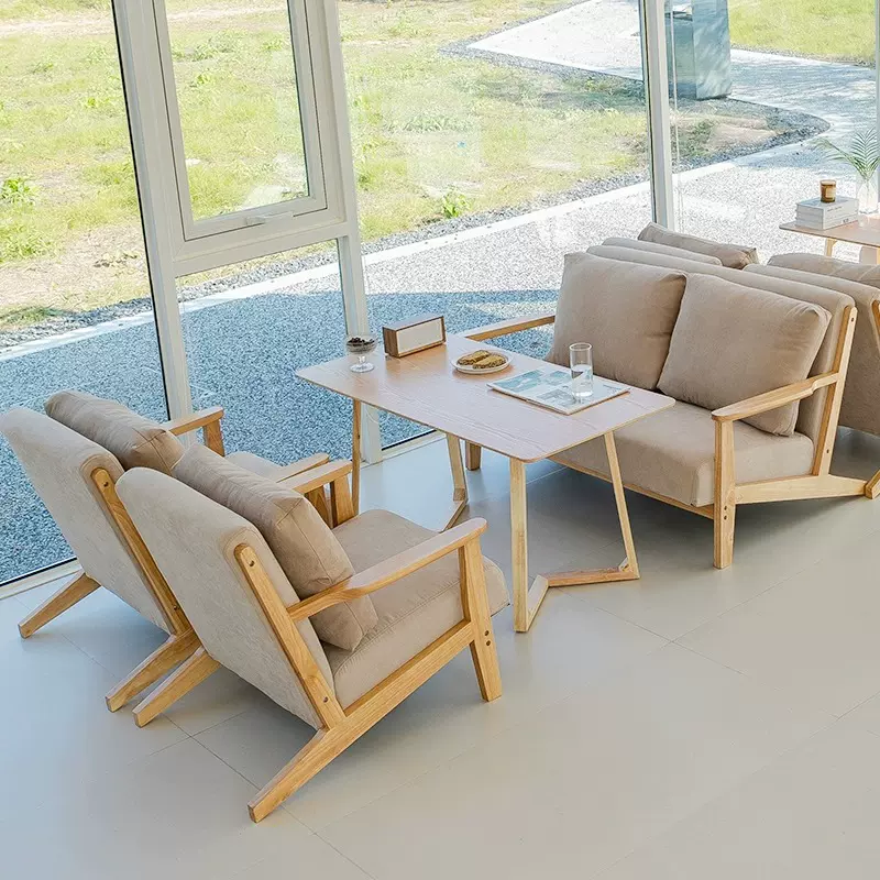 咖啡厅桌椅组合茶楼酒吧奶茶店单人沙发椅子民宿酒店休闲区原木风