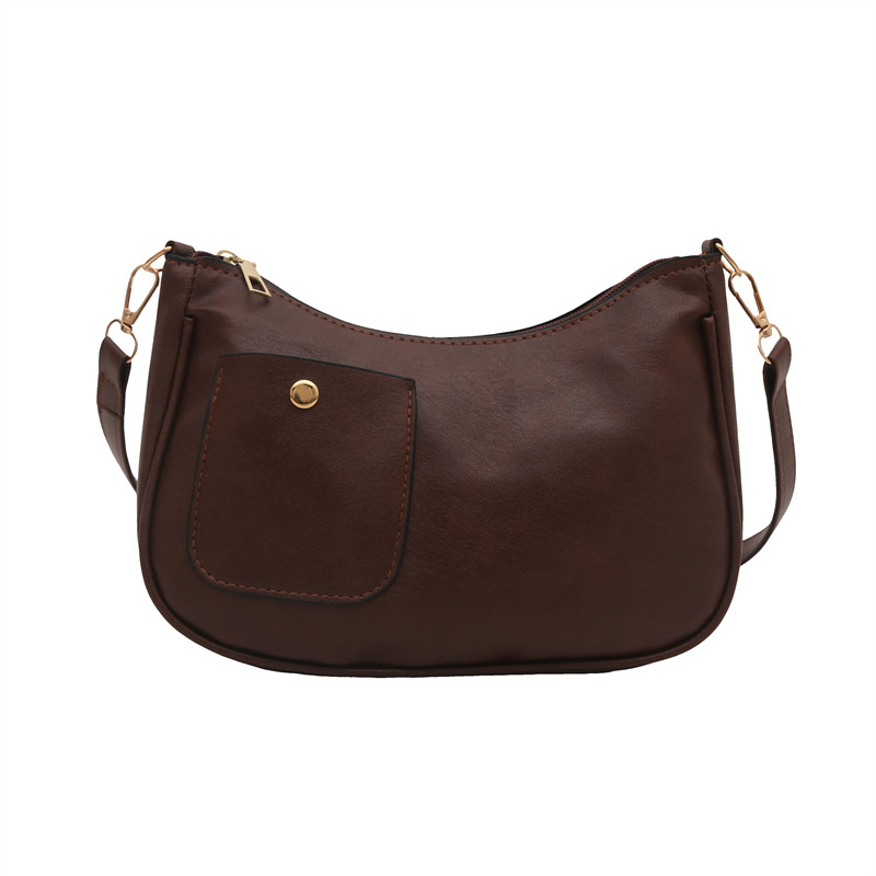 Bolso de mujer retro coreano personalidad 2025 bolso de media luna de hombro de estilo nuevo estilo francés bolso de diseño de nicho bajo la axila