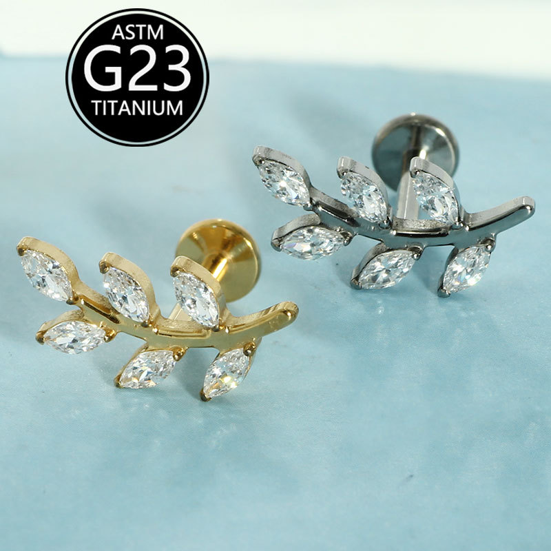 Silver pointed spike labret stud material detail