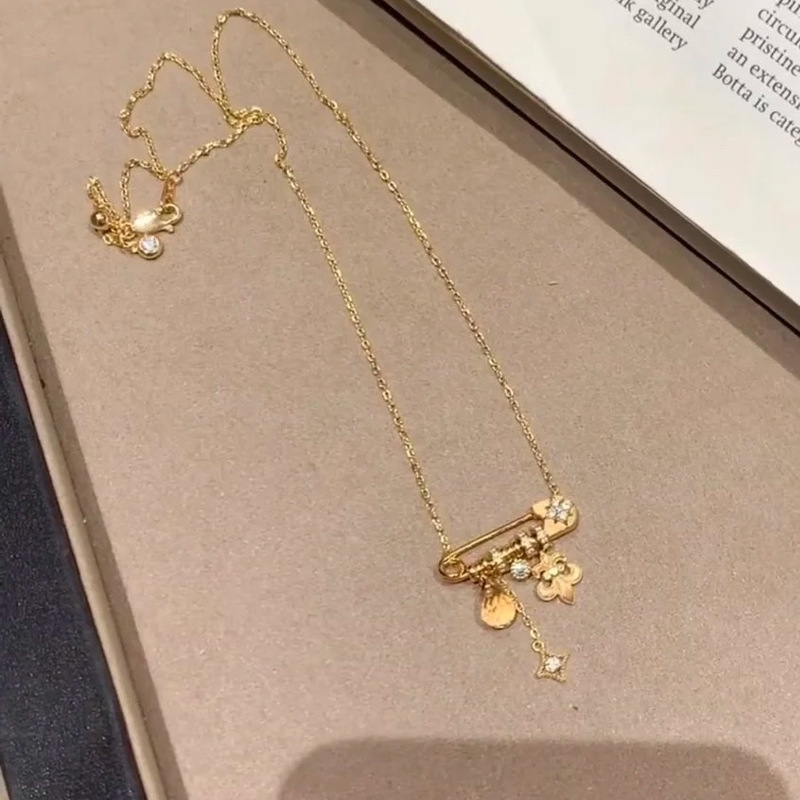 小红书爆款拉丝鸢尾花星芒黄水吊坠2025新款别针项链中古感锁骨链|undefined