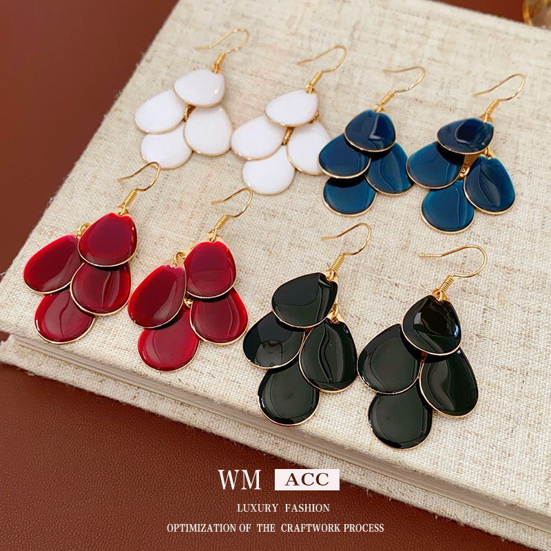 Gotas de agua de color sólido, escamas, borlas, ganchos para las orejas, pendientes largos de alta gama europeos y americanos, tendencia de la moda, pendientes creativos, mujeres