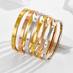 外国貿易の熱い販売の簡単な予約のカードの家の3色の腕輪の4mmの狭い版の10ドリルの経典のバックルのカップルのブレスレット