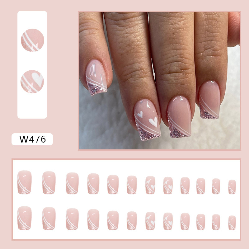 Style français explosif européen mi-long portant une armure, mignon et attentionné, lignes minimalistes, pièces de nail art, faux ongles_voghion.com