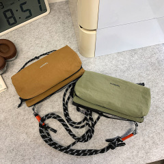 日本のファッションブランドの百掛けの小さいショルダーバッグの男女は同じタイプのレジャーの多層の携帯電話を包んで、軽い登山の水筒のリュックサックinsを包みます。