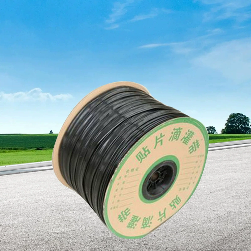 Внутренний инкрустированный капельный ремень для капельного орошения Оптовая продажа сельскохозяйственных полевых сараев садовых овощных пленок