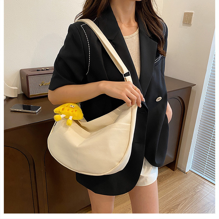 Simple solid-color canvas bag 2024 new style Japanese large-capacity single-shoulder dumpling bag, versatile for school and commuting crossbody bag undefined