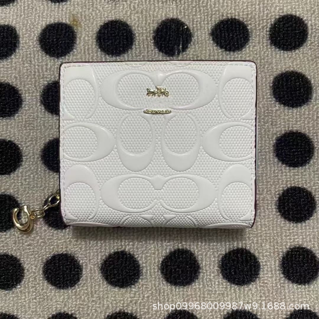 Glossy embossed white