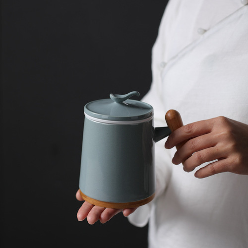 Ceramic tea cup with lid tea water separation filter cup creative wooden handle mug office cup gift water cup manufacturer