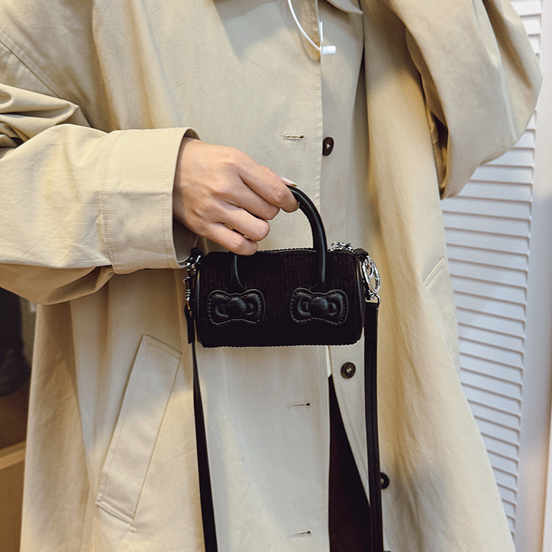 Otoño y invierno nuevo tipo de bolso de niños de ternero mini exquisita bolso de hombro para hombres y mujeres, moda popular para padres e hijos bolso de cubo de agua