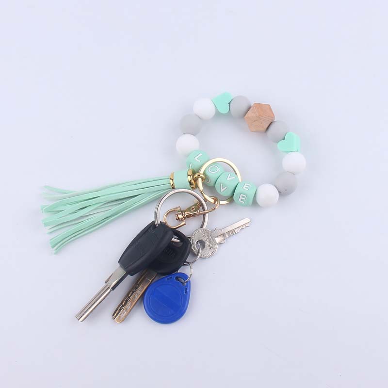 Nuevo cuero creativo pu borla colgante DIY nombre silicona cuentas colgante pulsera llavero Accesorios