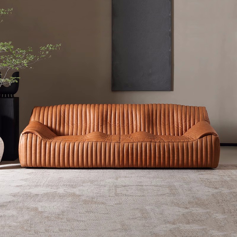 Sofá de cuero antiguo minimalista diseñador de vivienda americana retrógrado sofá de piel de cera caramelo onda