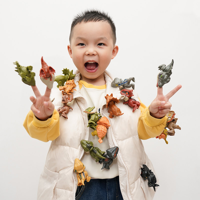 指をかむ恐竜のおもちゃの震え音ネットの赤い同型の子供は手をかむ恐竜のおもちゃの卸売りの新しい奇抜な模型の袋をかむ|undefined